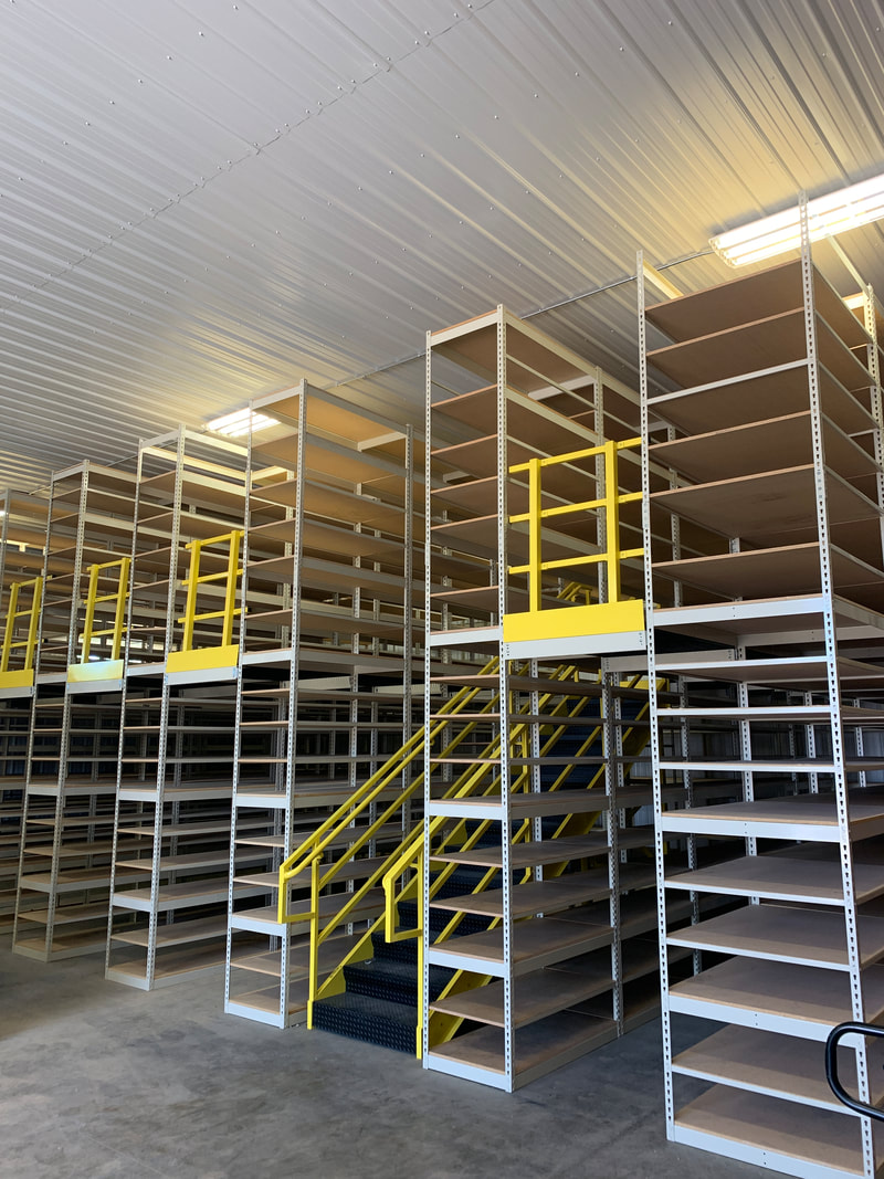 shelving with shelf supported mezzanine